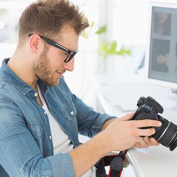 male photographer looking at camera