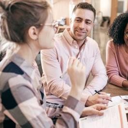 three people in meeting