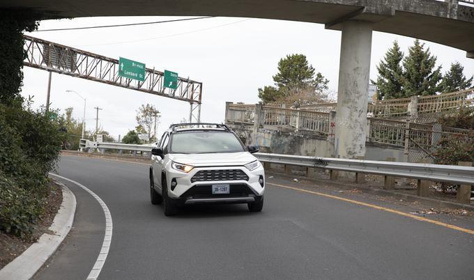 Car driving through city