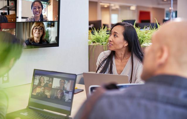Employees in the office on a video conference call. 