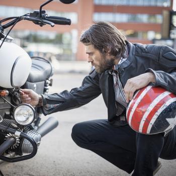 Man looking at motorcycle_Getty.jpg