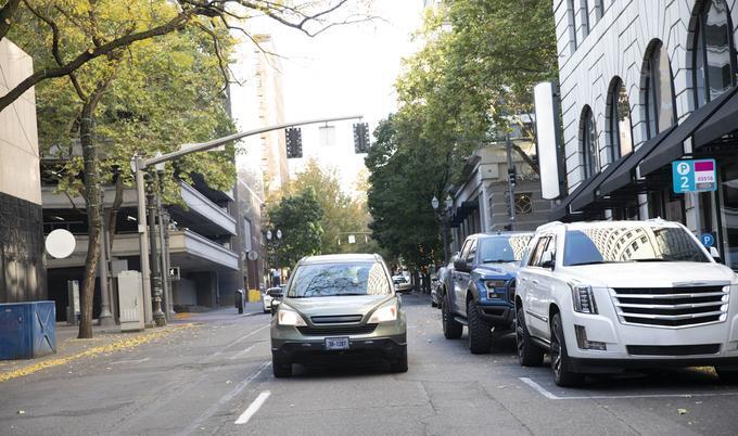 Car driving through city