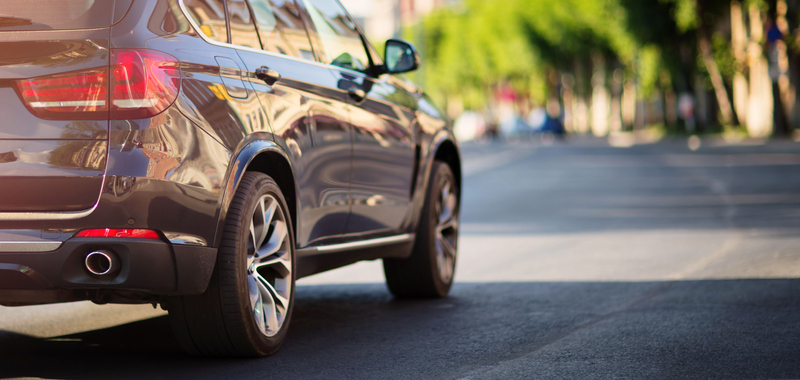Close up of the back end of a car on the road
