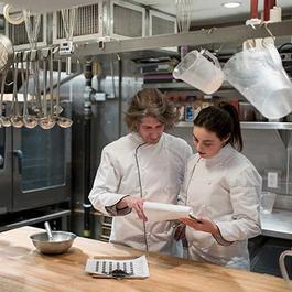 two chefs in kitchen