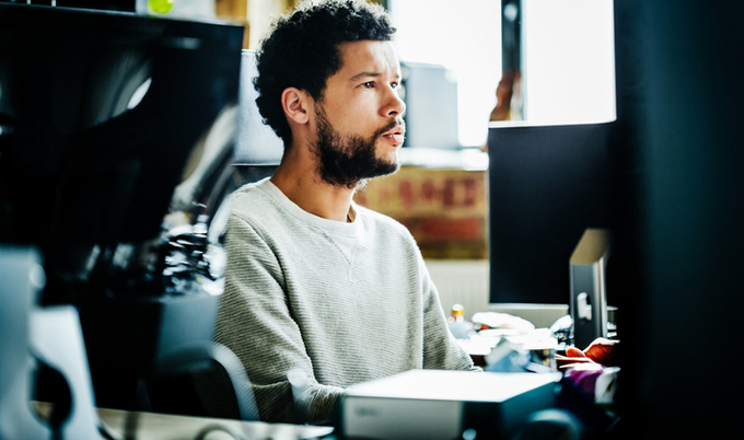 Man sitting at computer in an office