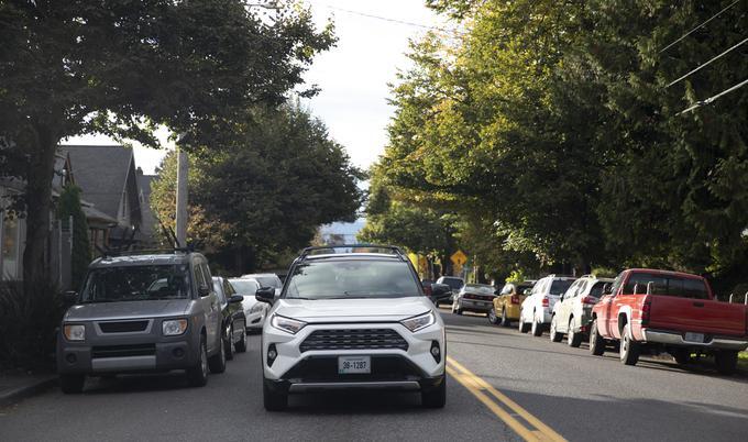 Car driving through city