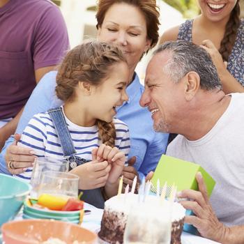 Retiree Celebrating Birthday With Granddaughter_Thinkstock.jpg